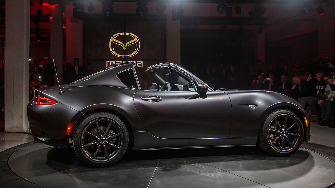 2017-Mazda-MX-5-Miata-RF-on-stage-side-rear-view.jpg